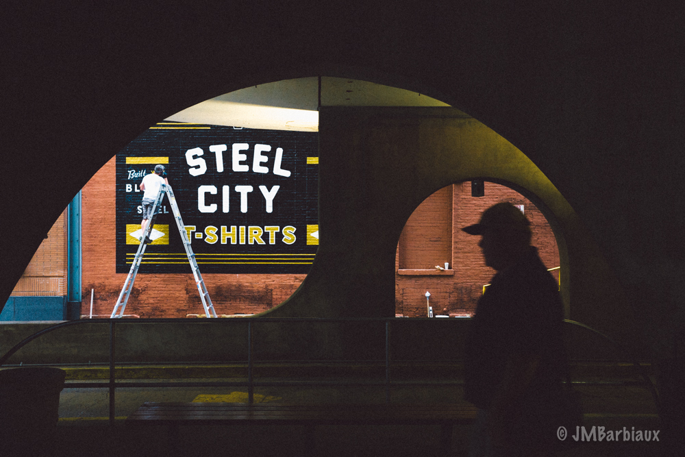 street photography, cinematic light, steel city, shadows, silhouette